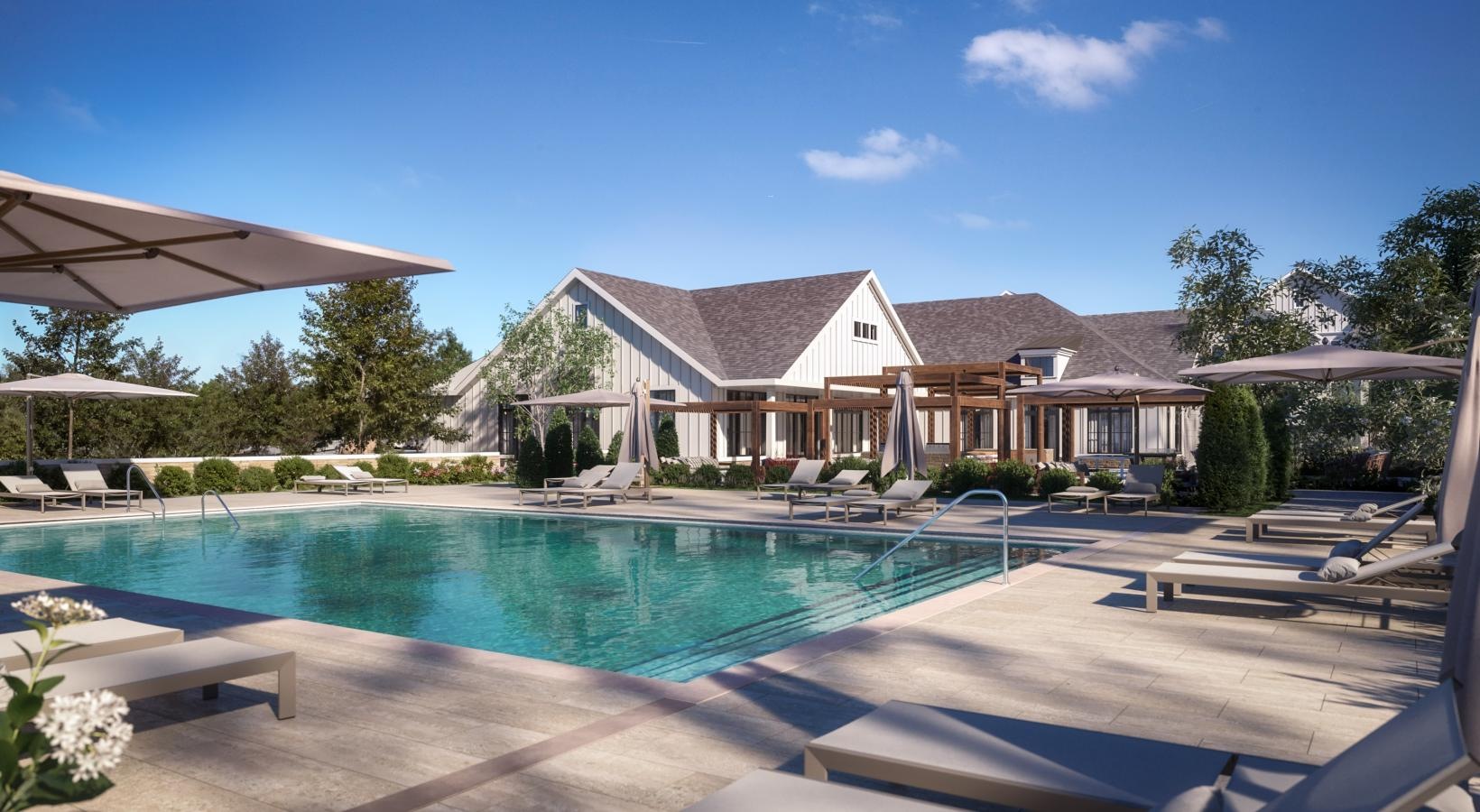 Resort-style swimming pool with lounge seating